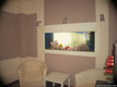 Пример встроенного аквариума в стене